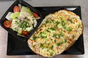 Tartine chaude Bruschetta « servie avec une salade d’accompagnement + 1€ la boisson »